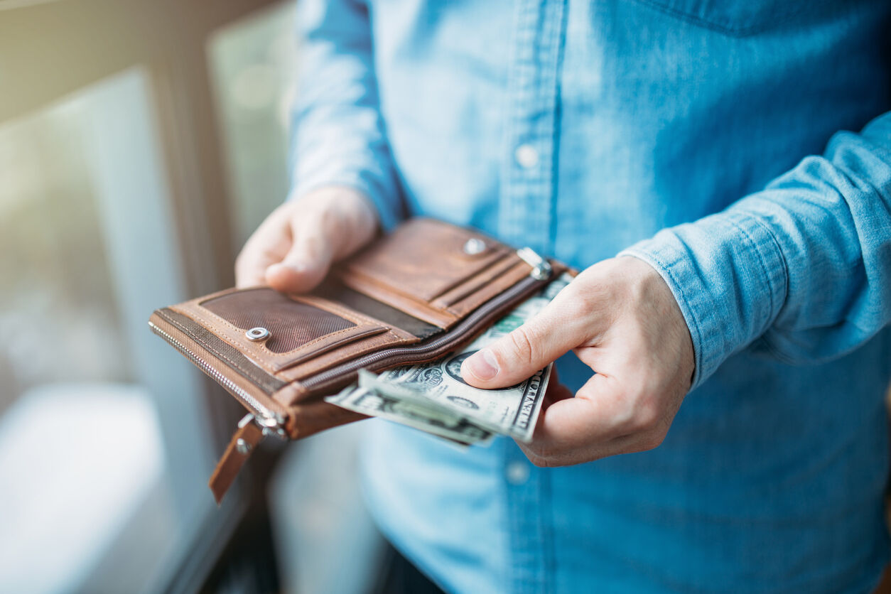 Man holding money banknote